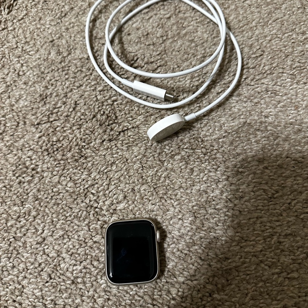 Apple Watch SE 2nd Gen with Charging Cable & several Watch straps & face covers